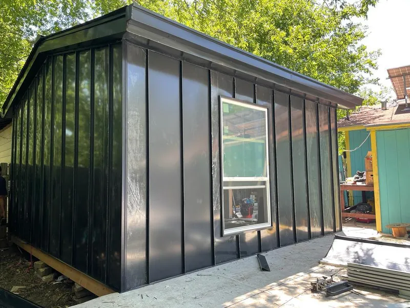 Black standing seam metal wall panels for Metal Roof Installation in Branson