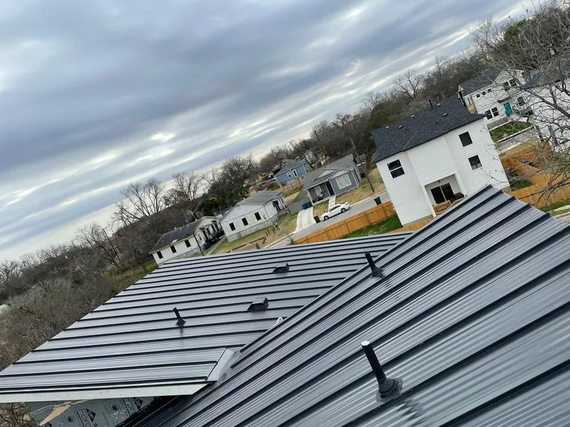 Standing seam metal roof panels with vents for Skylight Repair in Branson